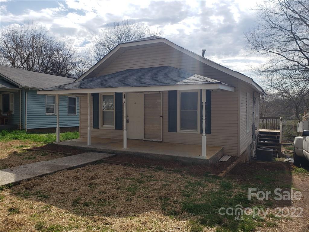 473 Liberty Drive Southwest Concord, NC 28027 - Photo 2 of 19 a front view of a house with a yard