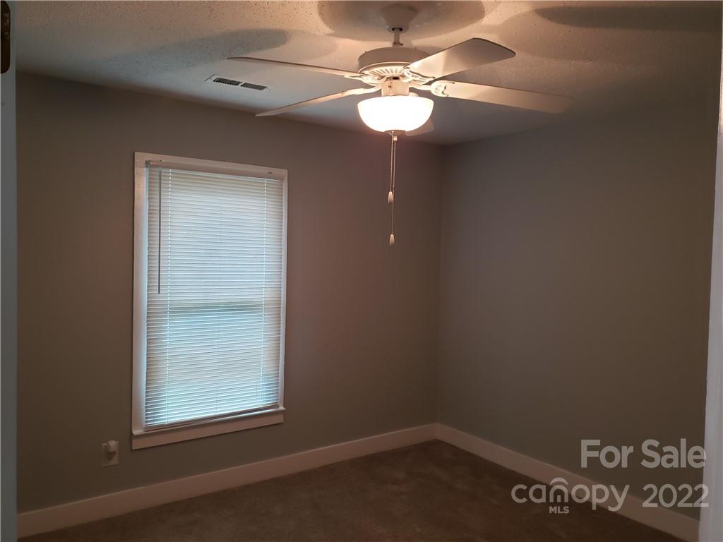 473 Liberty Drive Southwest Concord, NC 28027 - Photo 6 of 19 an empty room with a window