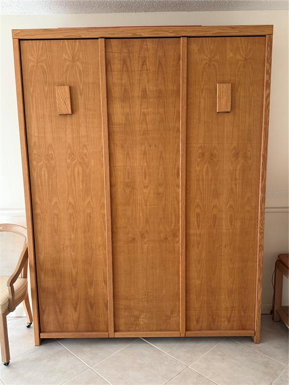 7701 Starkey Road, Unit 703 Seminole, FL 33777 - Photo 5 of 23 a view of walk in closet with window