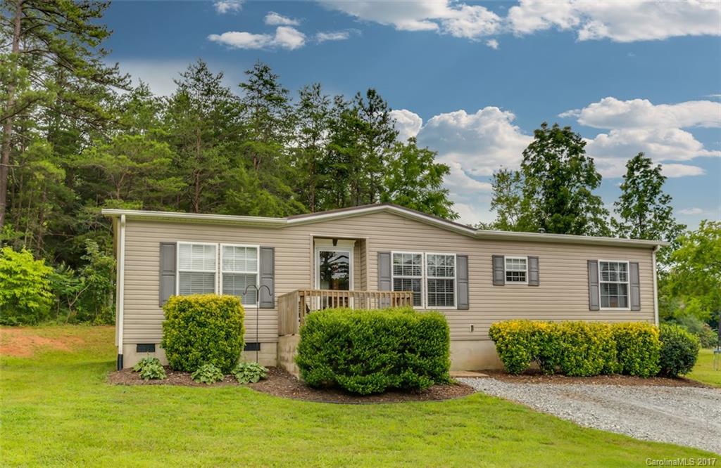 230 Cane Creek Road Rutherfordton, NC 28139 - Photo 1 of 18 a front view of a house with a yard