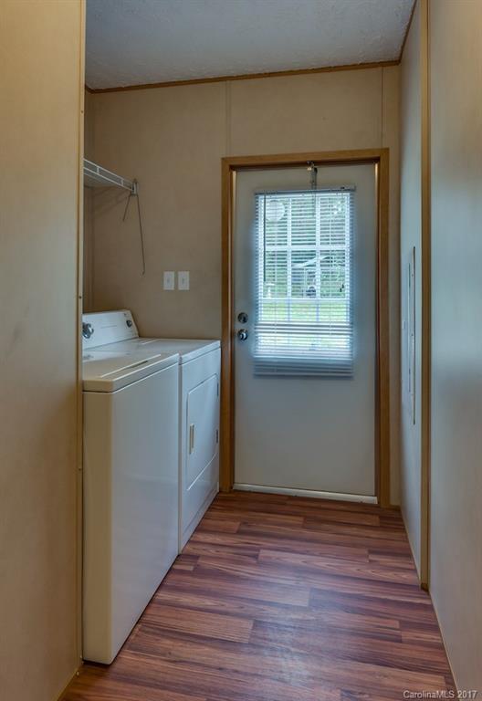 230 Cane Creek Road Rutherfordton, NC 28139 - Photo 11 of 18 a view of a kitchen from a hallway