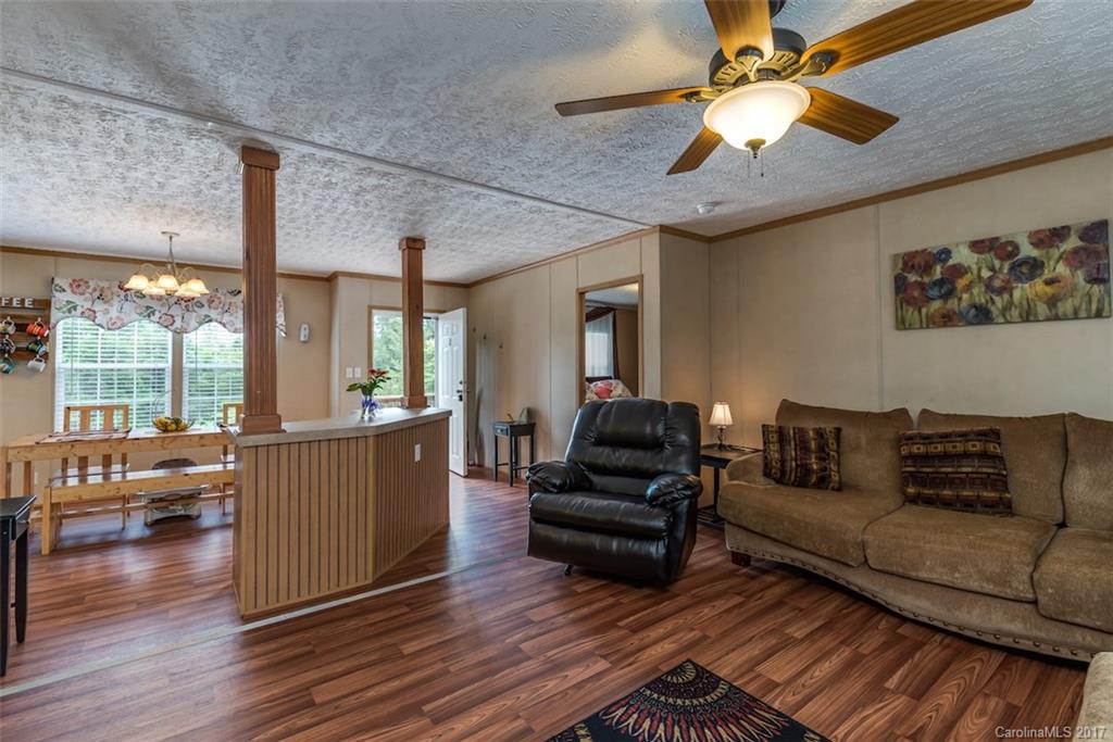 230 Cane Creek Road Rutherfordton, NC 28139 - Photo 8 of 18 a living room with furniture and a wooden floor