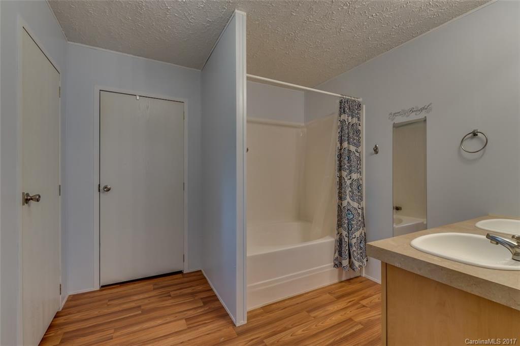 230 Cane Creek Road Rutherfordton, NC 28139 - Photo 10 of 18 a bathroom with a sink and a shower