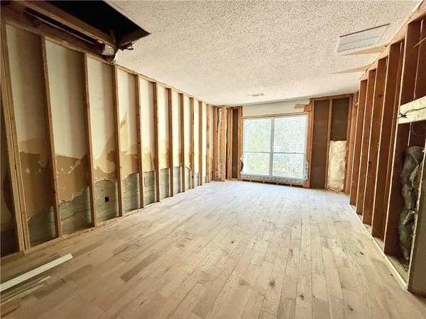 a view of a utility room with windows