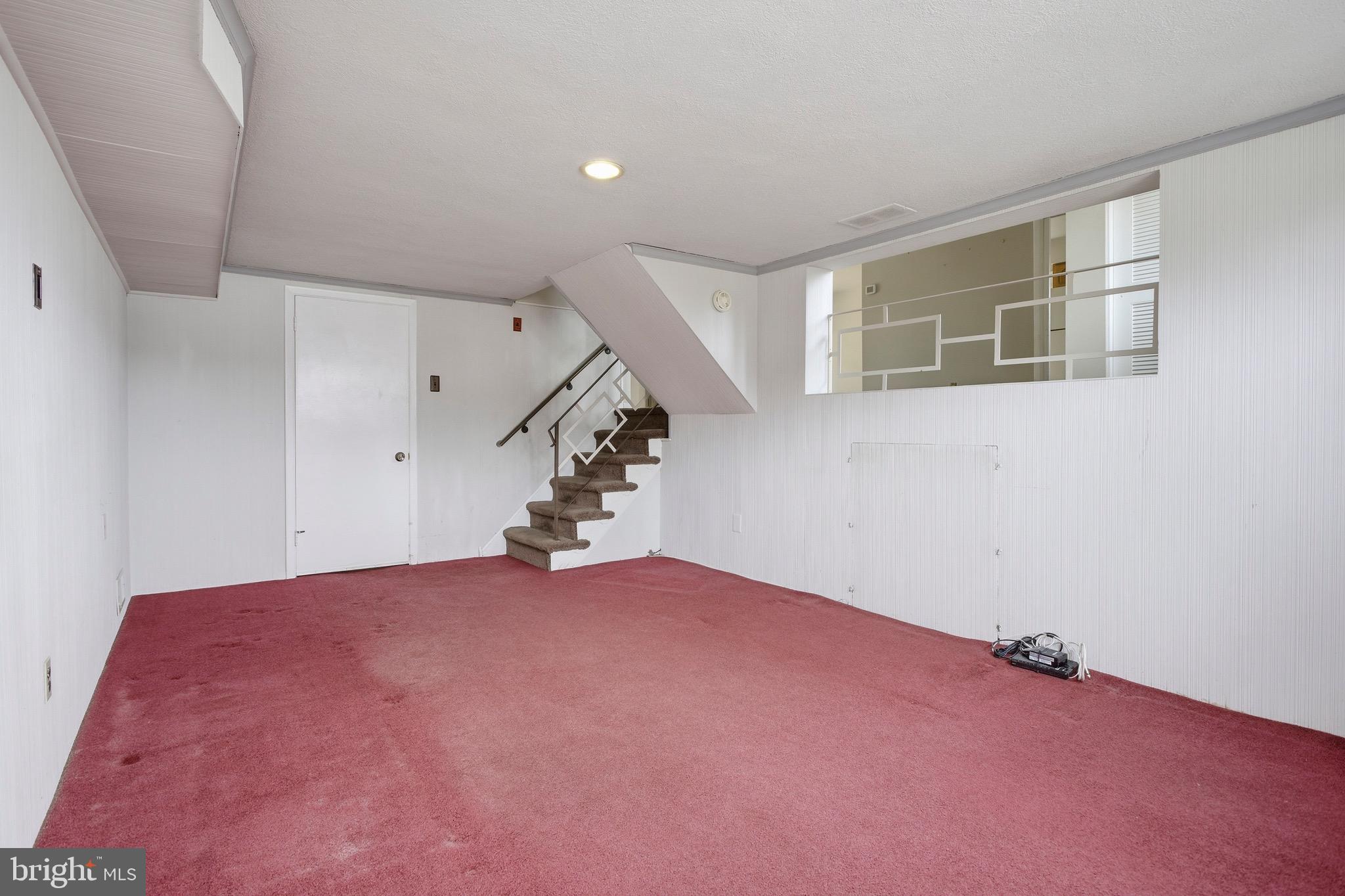 412 Foster Drive Springfield, PA 19064 - Photo 24 of 34 a view of empty room with stairs