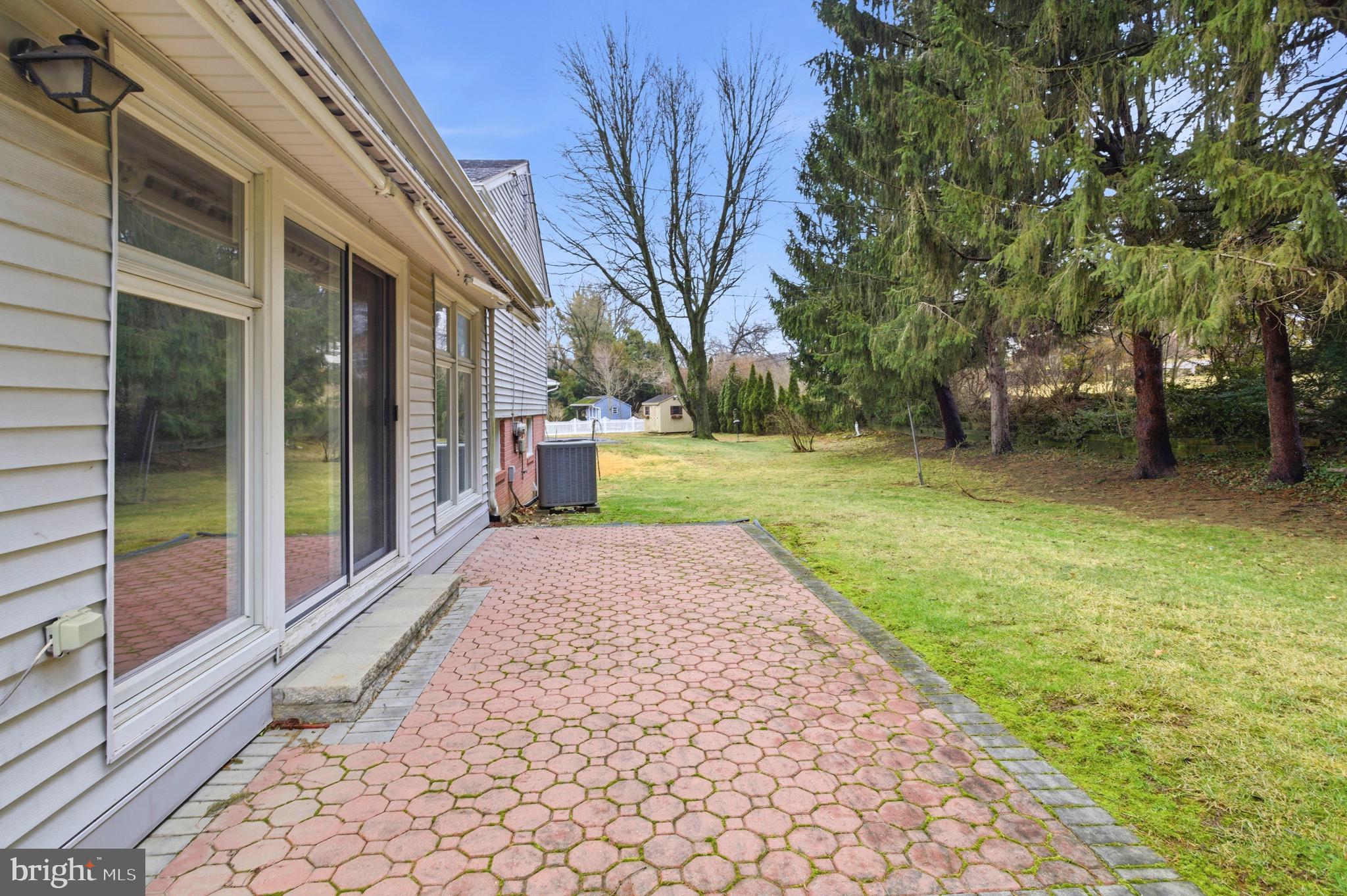 412 Foster Drive Springfield, PA 19064 - Photo 30 of 34 a view of a house with backyard and garden