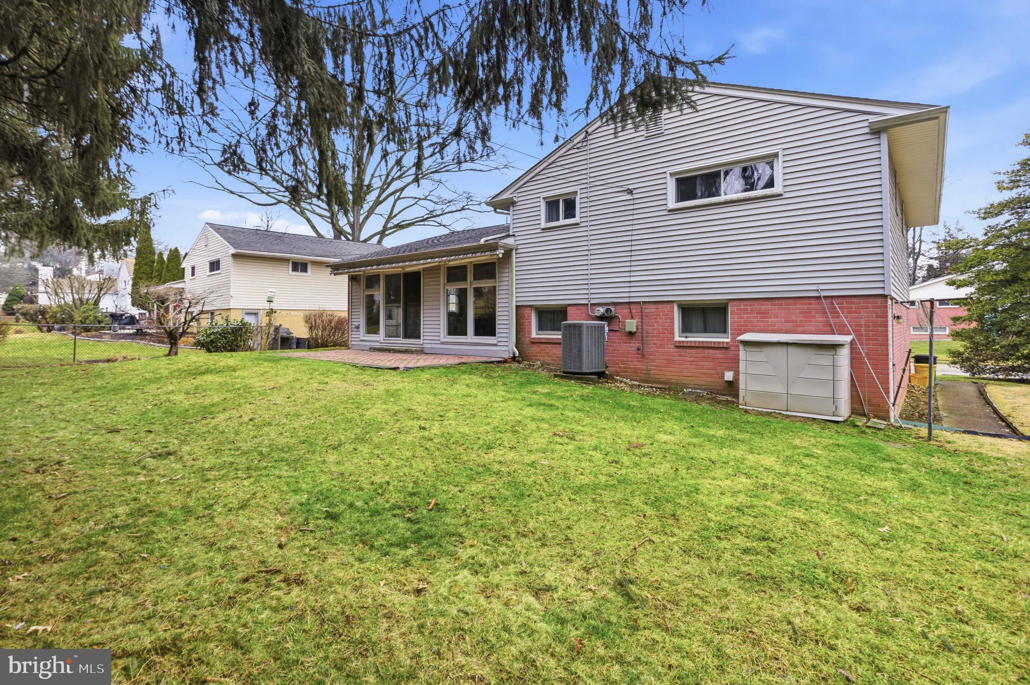 412 Foster Drive Springfield, PA 19064 - Photo 33 of 34 a view of a house with a yard