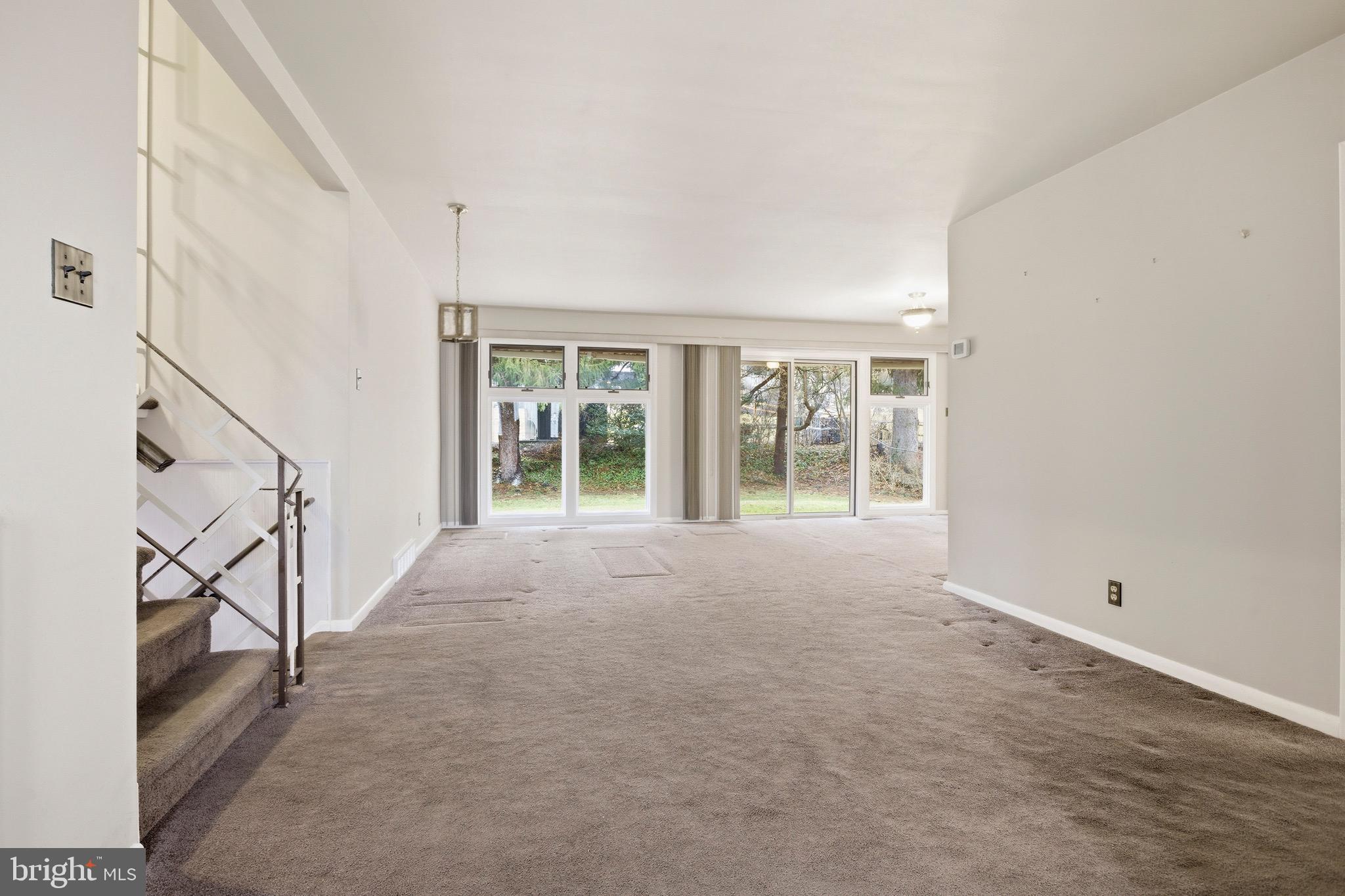 412 Foster Drive Springfield, PA 19064 - Photo 4 of 34 an empty room with windows
