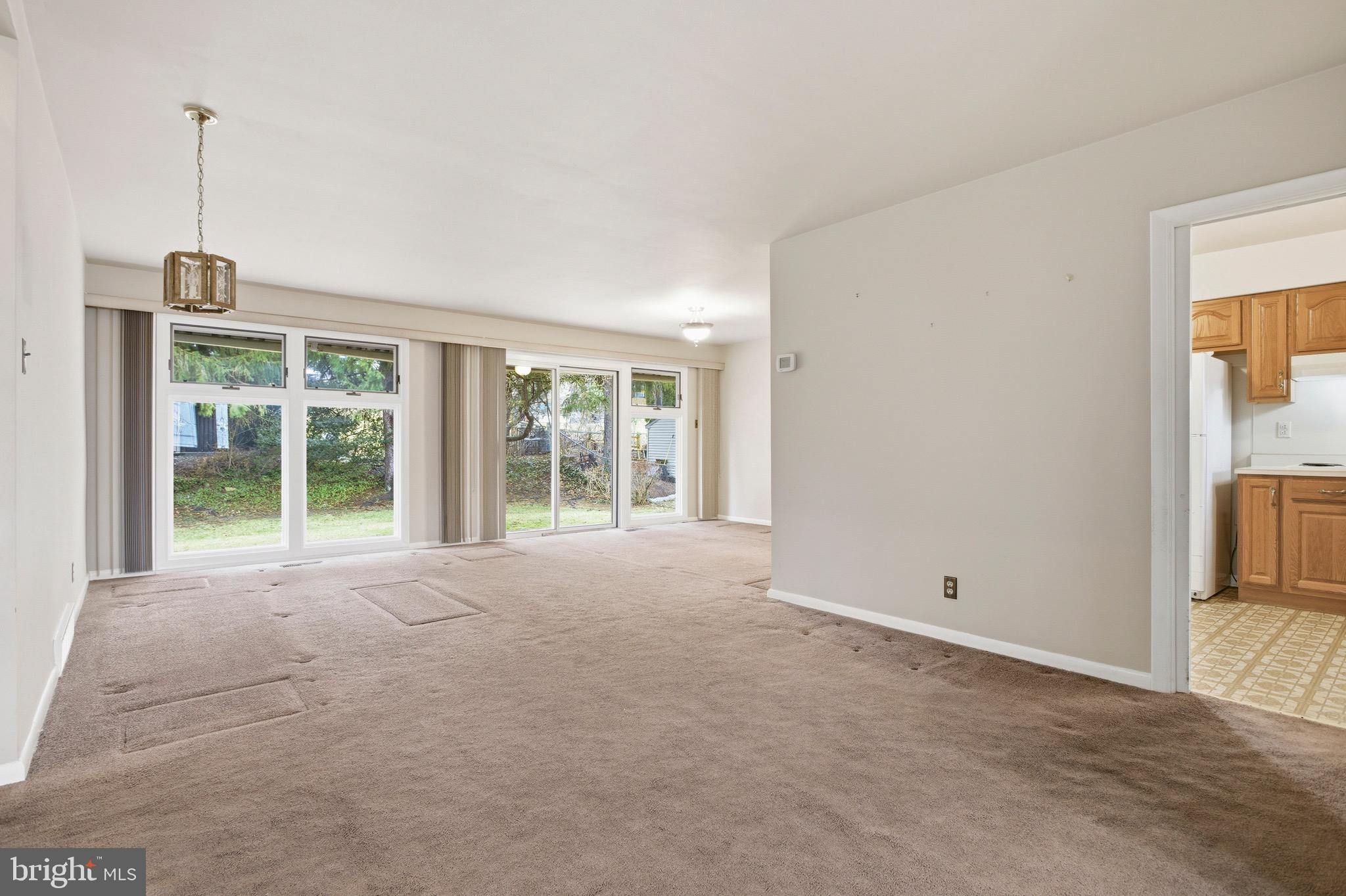 412 Foster Drive Springfield, PA 19064 - Photo 5 of 34 a view of an empty room with a window