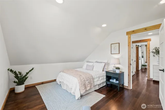 a view of a house with backyard porch and sitting area