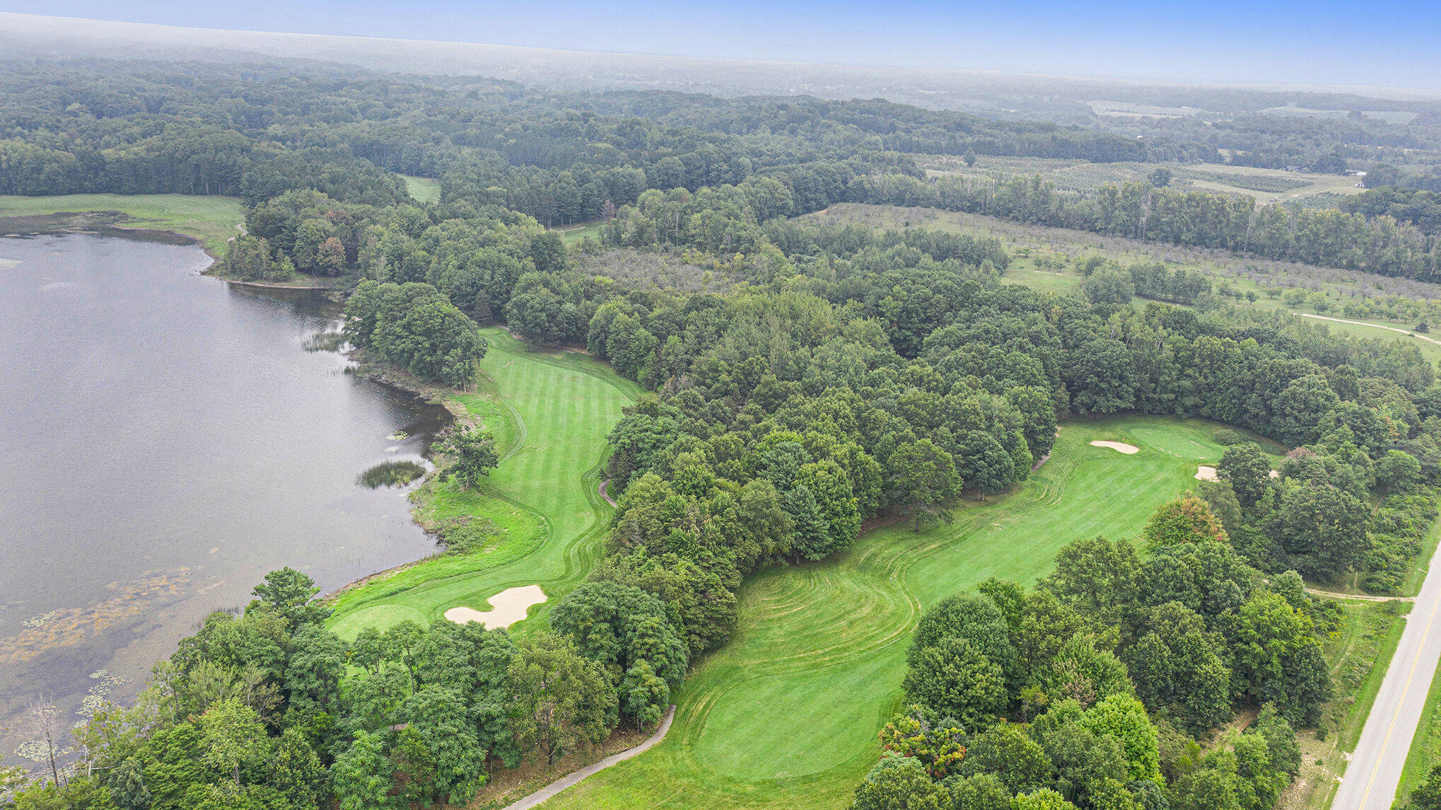 3300 West Wilke Road, Unit 203 Rothbury, MI 49452 - Photo 36 of 45 037_dji_0239
