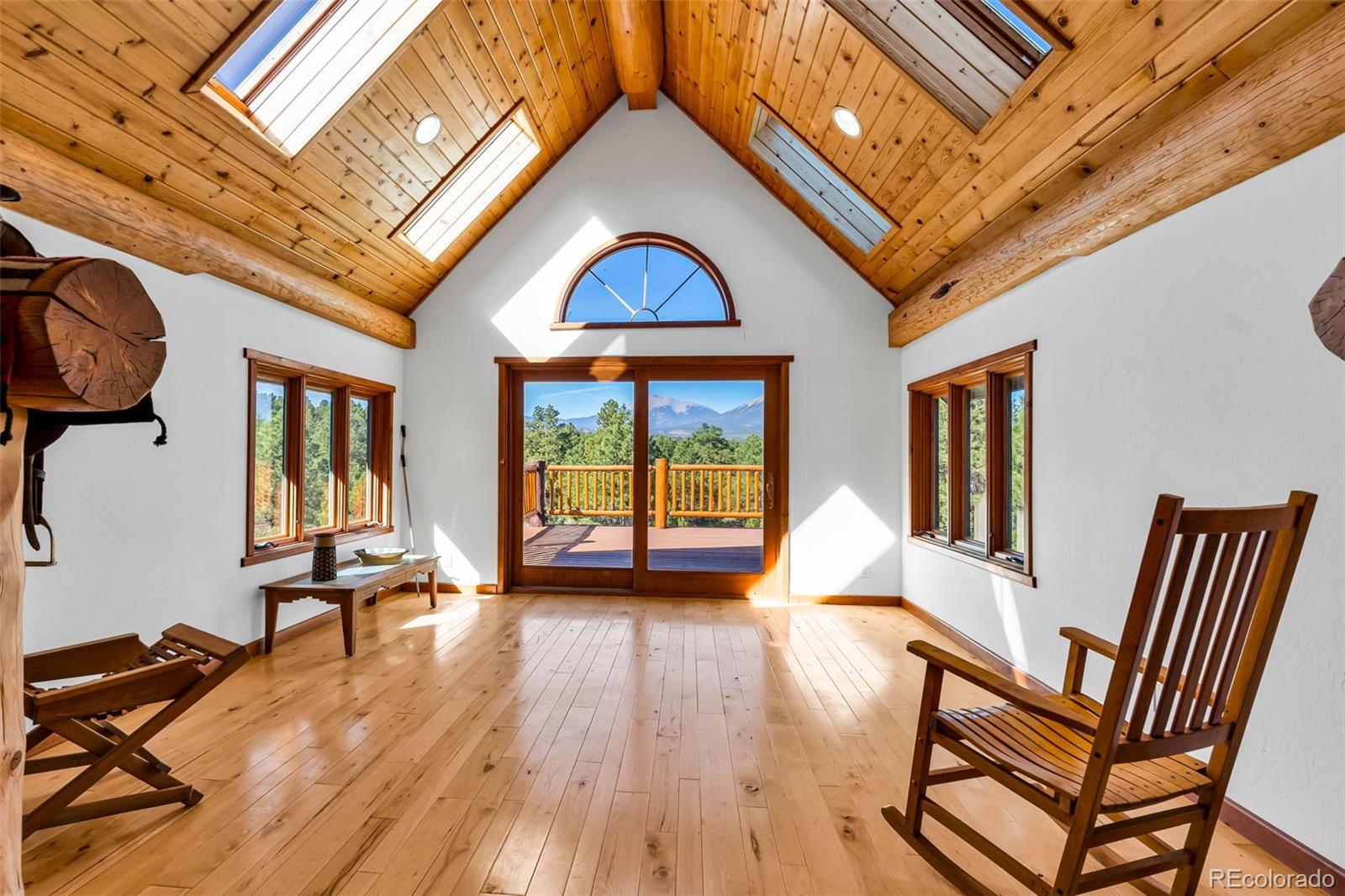23100 Spirit Mountain Road Aguilar, CO 81020 - Photo 16 of 41 a view of hall way with furniture and staircase
