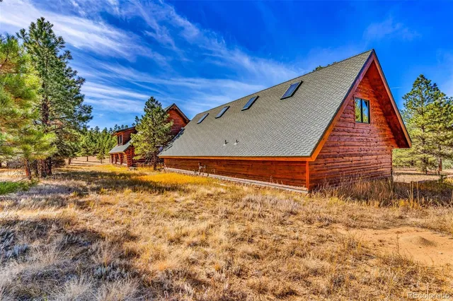 a backyard of a house with lots of green space