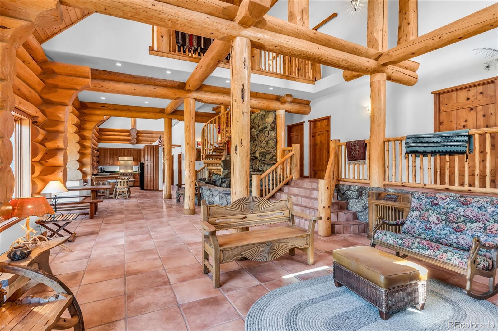 23100 Spirit Mountain Road Aguilar, CO 81020 - Photo 8 of 41 a outdoor space with patio the couches and a dining table with the couches and potted plants with sky view