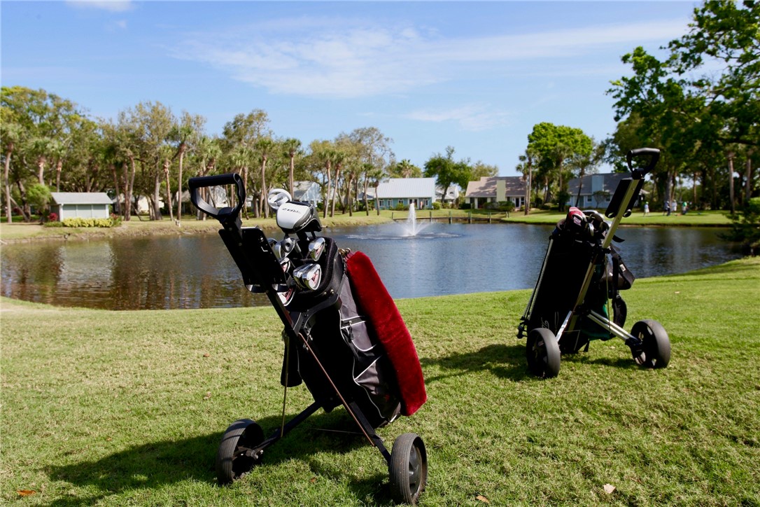 9518 Riverside Drive Sebastian, FL 32958 - Photo 12 of 22 a view of a park with swings