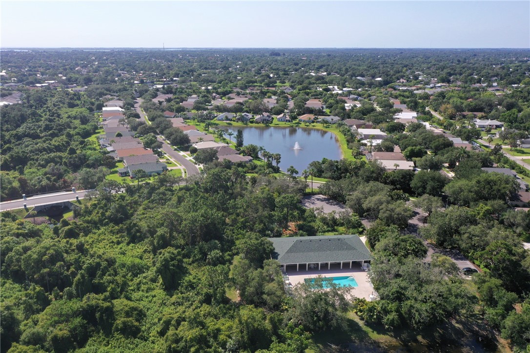 9518 Riverside Drive Sebastian, FL 32958 - Photo 16 of 22 an aerial view of a house with a garden