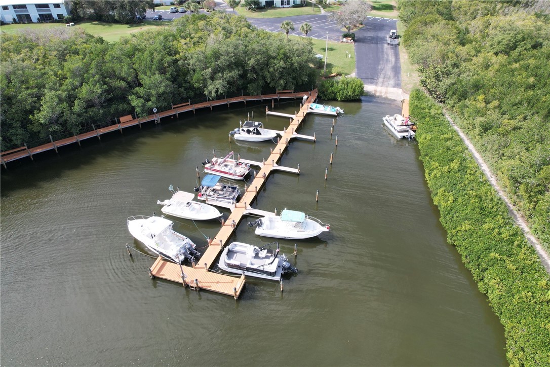 9518 Riverside Drive Sebastian, FL 32958 - Photo 17 of 22 an aerial view of a table and chairs in patio
