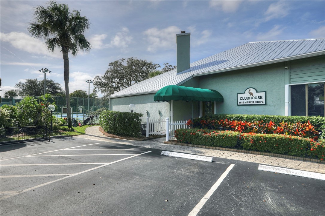 9518 Riverside Drive Sebastian, FL 32958 - Photo 19 of 22 a front view of a house with garden