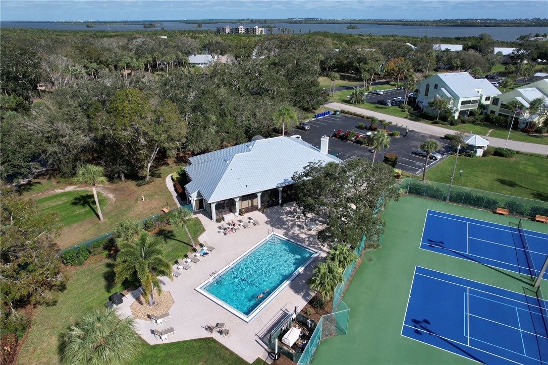 9518 Riverside Drive Sebastian, FL 32958 - Photo 21 of 22 an aerial view of multiple houses with a yard