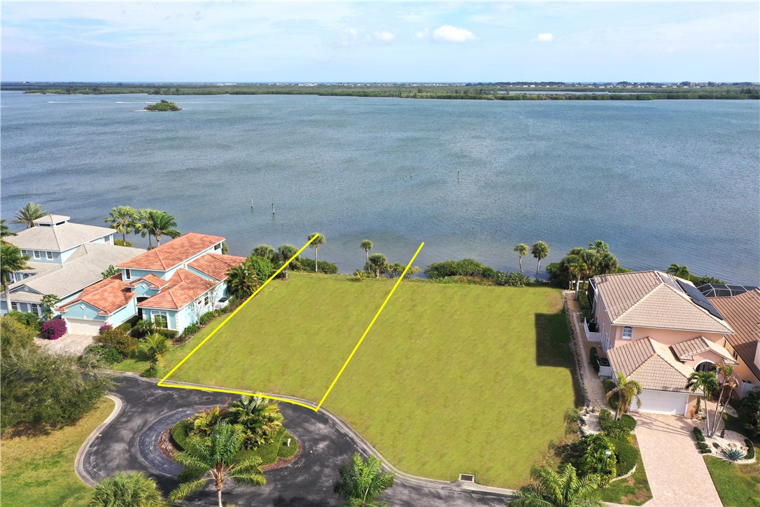 9518 Riverside Drive Sebastian, FL 32958 - Photo 3 of 22 a view of a swimming pool and outdoor seating