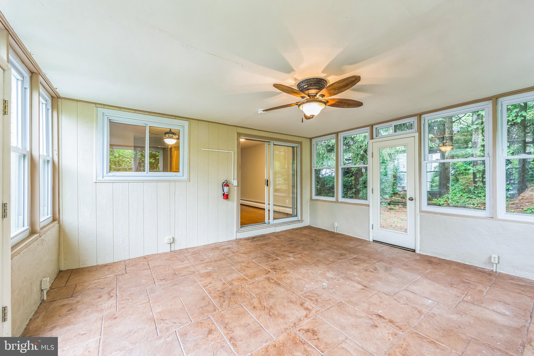 4 Woodview Road Malvern, PA 19355 - Photo 19 of 33 Sun Room - 2 Outside Entrances