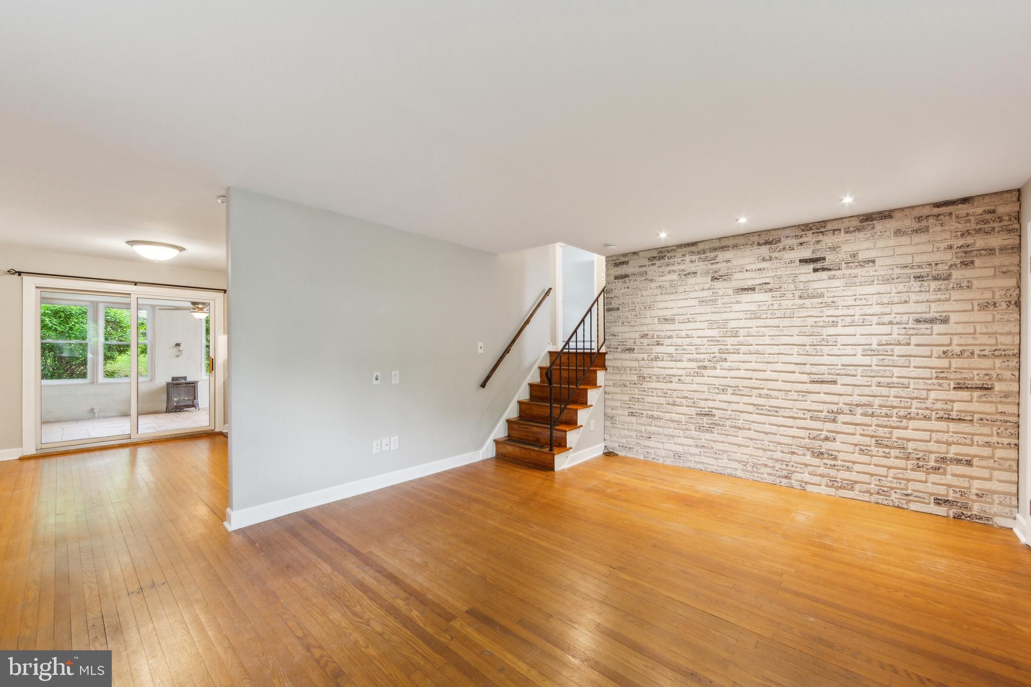 4 Woodview Road Malvern, PA 19355 - Photo 7 of 33 Family Room - Brick Wall