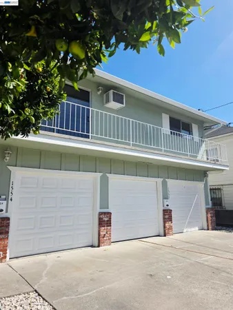 a front view of a house with a garage