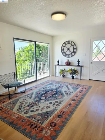 a view of a livingroom with furniture and window