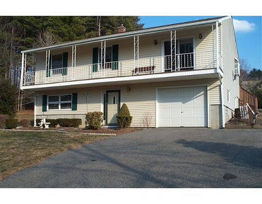 106 River Road Ware, MA 01082 - Photo 1 of 1 a front view of a house with a yard