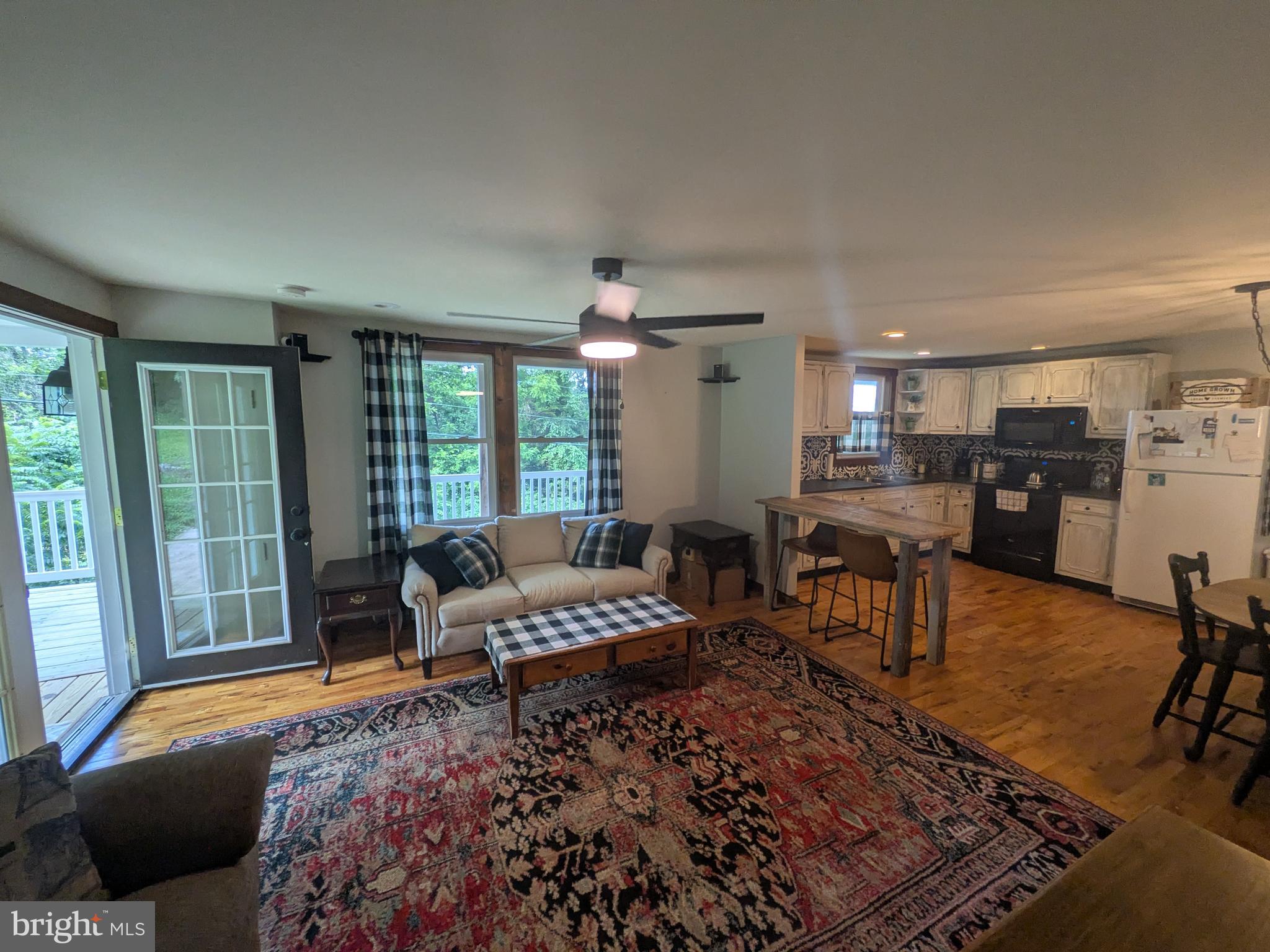 2418 Muddy Run Road Mifflintown, PA 17059 - Photo 25 of 44 a living room with furniture and a large window