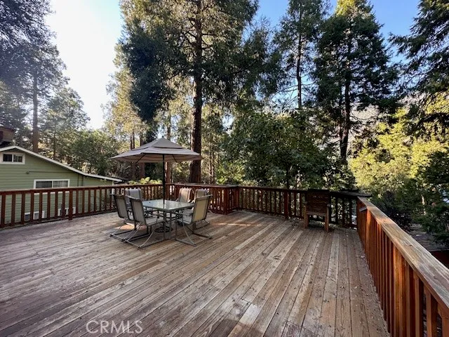 a view of a deck with furniture