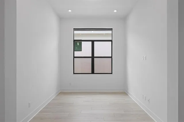 an empty room with windows