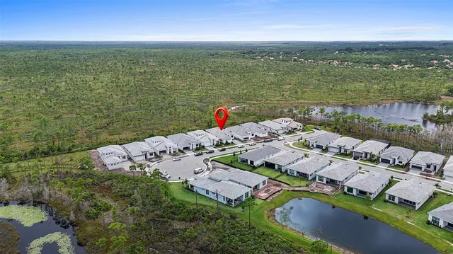 a view of lake with green space