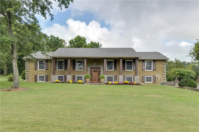 968 Sneed Road West Franklin, TN 37069 - Photo 1 of 20 Beautiful curb appeal! This fabulous updated home has a new facade and stained wood pillars. Set on 2.4 private acres, there is plenty of room for outdoor entertaining and a large garden. Enjoy a little bit of country in the heart of Franklin, TN!