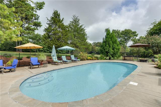 968 Sneed Road West Franklin, TN 37069 - Photo 18 of 20 For fun in the sun, this In-ground gunite pool is perfect to cool off in on a hot summer's day. Lush landscaping surrounds the fenced area. The pool deck is spacious with lots of room for outdoor furniture and unbrellas--plenty of room to entertain