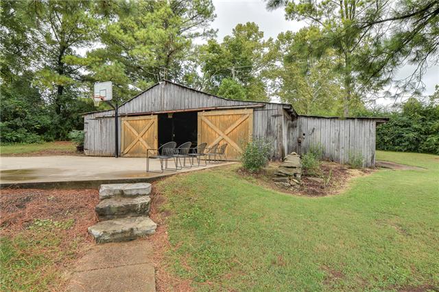 968 Sneed Road West Franklin, TN 37069 - Photo 19 of 20 This large barn has electricity and can house up to 4 vehicles. It is also perfect for horses or a workshop! There is a separate gravel driveway to the barn from Sneed Rd. for easy access.