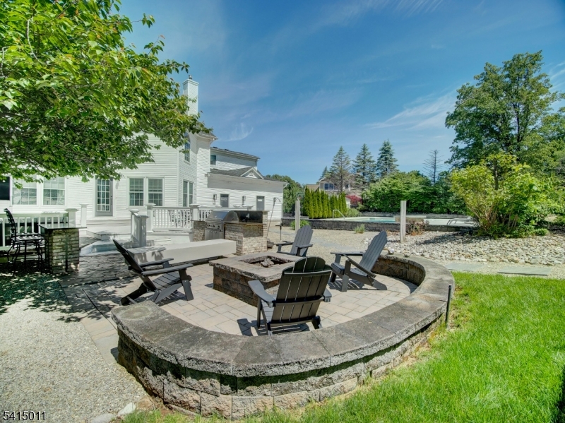23 Ryerson Road Flemington, NJ 08822 - Photo 39 of 44 a view of a house with backyard swimming pool and sitting area