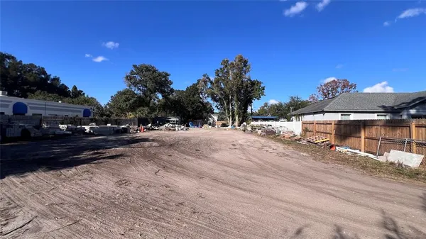 a view of a backyard of the house