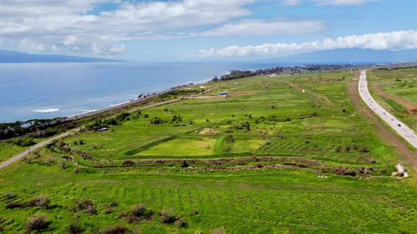 a view of a lake with a big yard