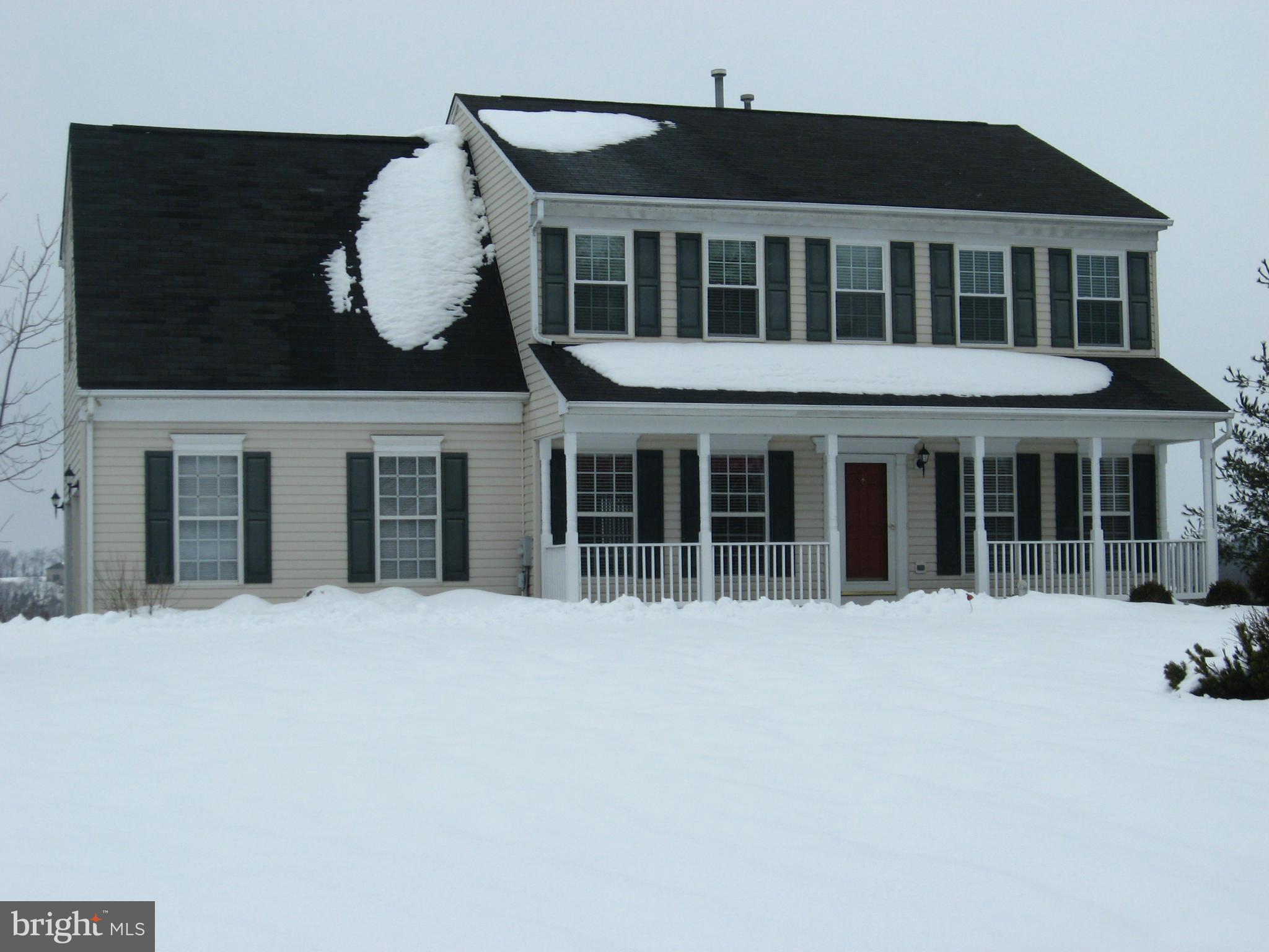 8822 Mapleville Road Mount Airy, MD 21771 - Photo 1 of 27 a front view of a house with a large window