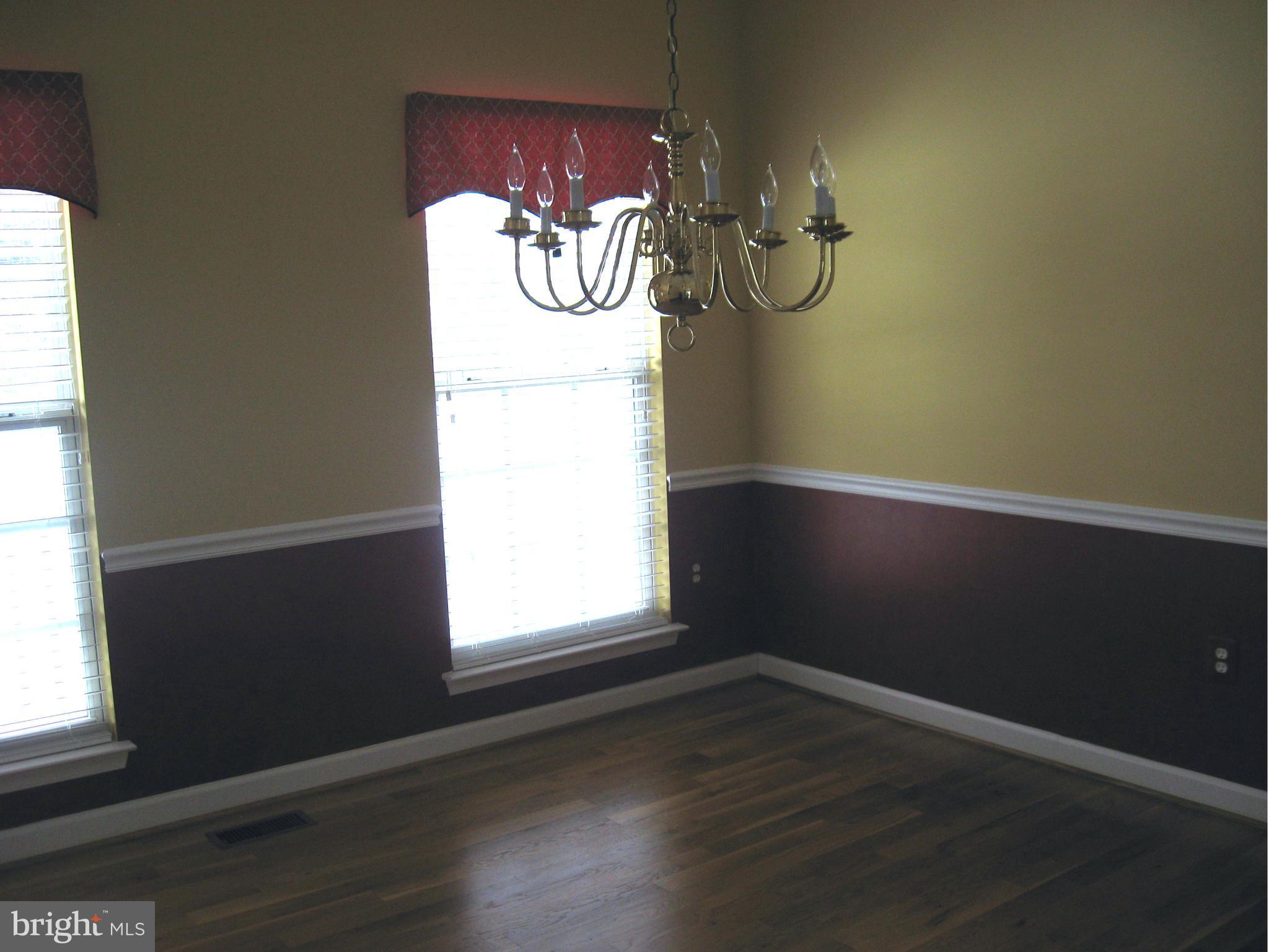 8822 Mapleville Road Mount Airy, MD 21771 - Photo 5 of 27 a view of small space with wooden floor and small window