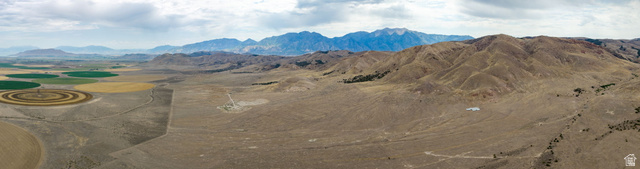 12800 South Crooked Cyn Road South Elberta, UT 84626 - Photo 3 of 48 Expansive land parcel featuring diverse topography with flat and rolling terrain