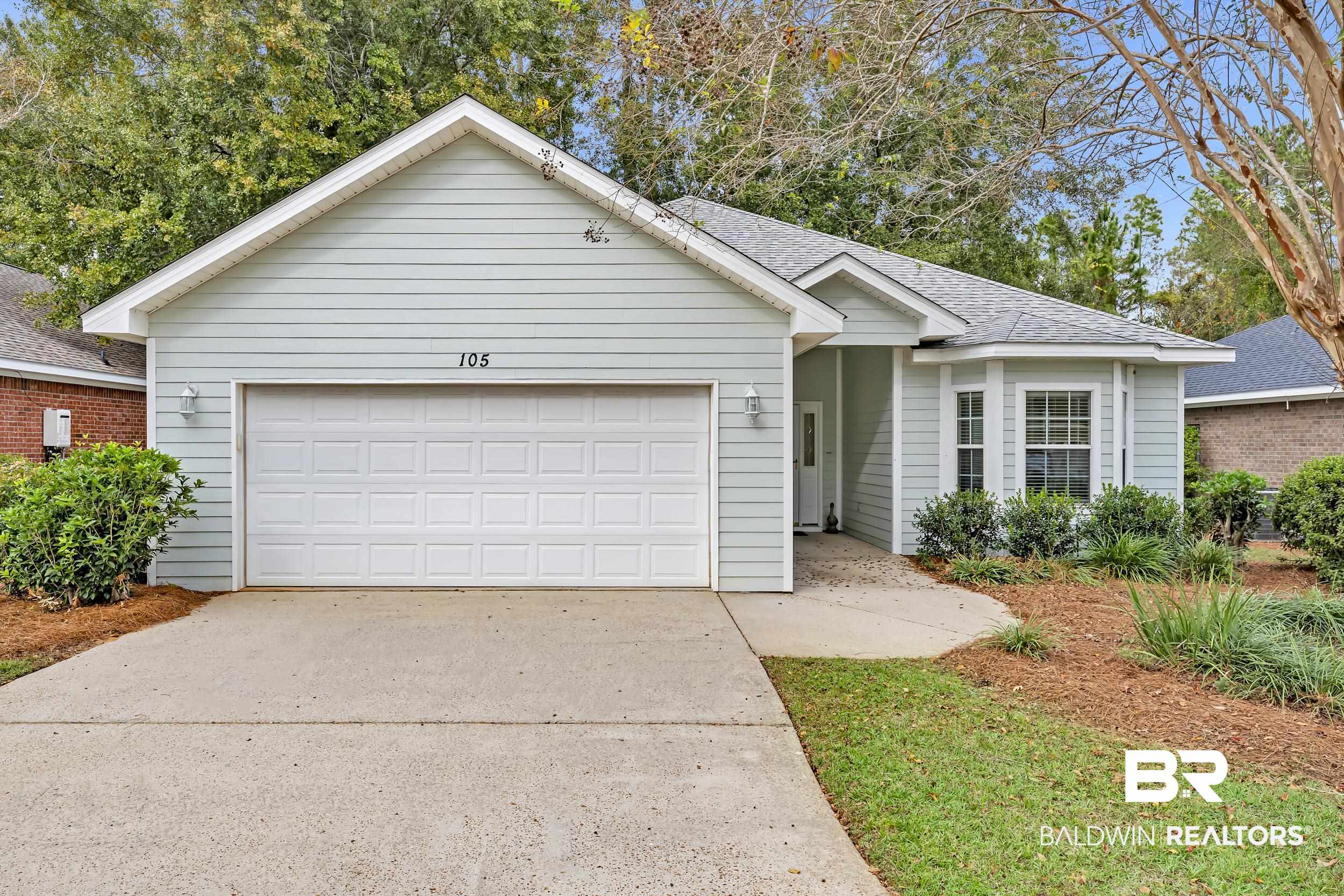 105 Mark Twain Loop Foley, AL 36535 - Photo 32 of 43 Ranch-style home with driveway, a shingled roof, and a garage