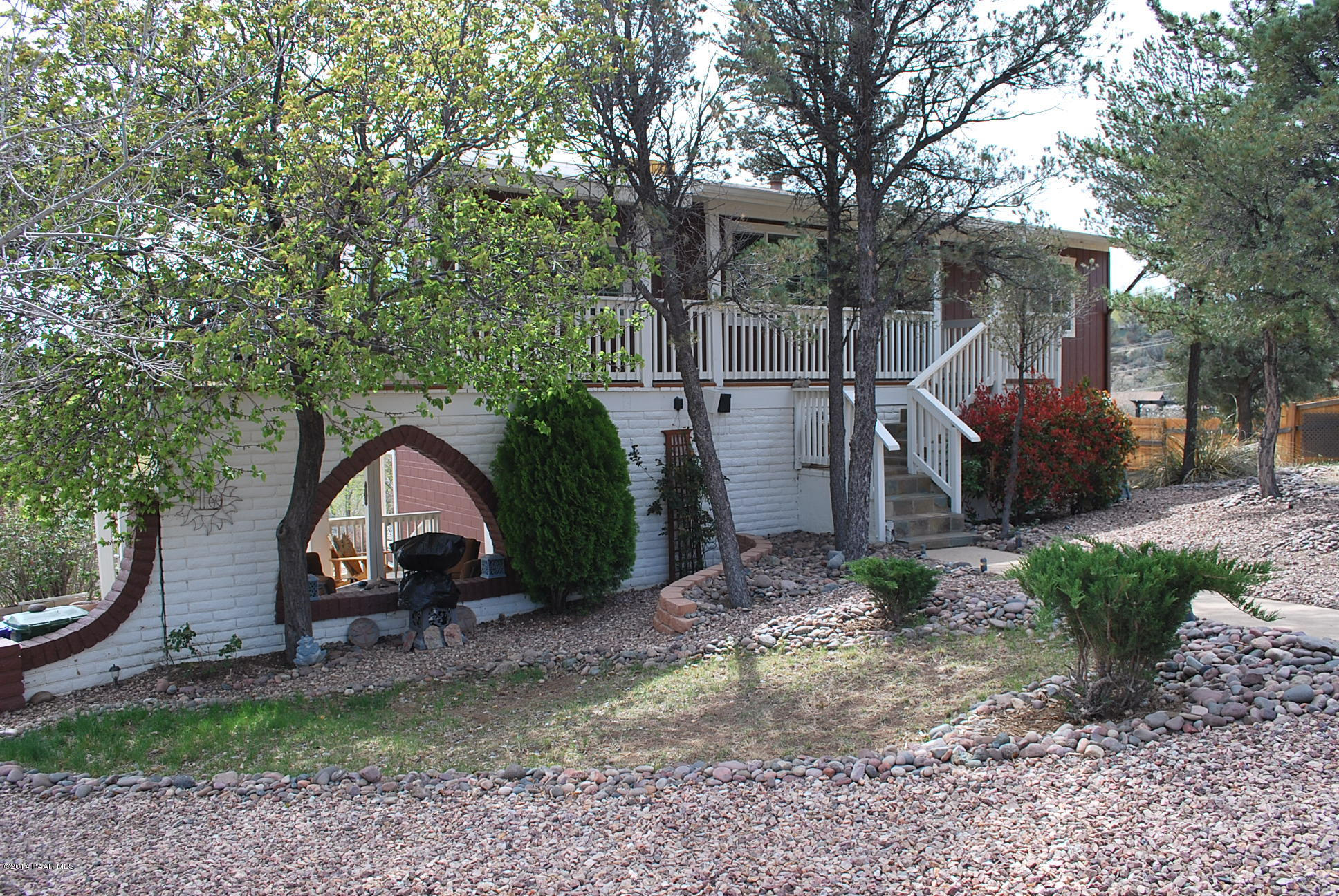 2701 Ridge Road Prescott, AZ 86301 - Photo 1 of 39 a view of a house with backyard and a tree