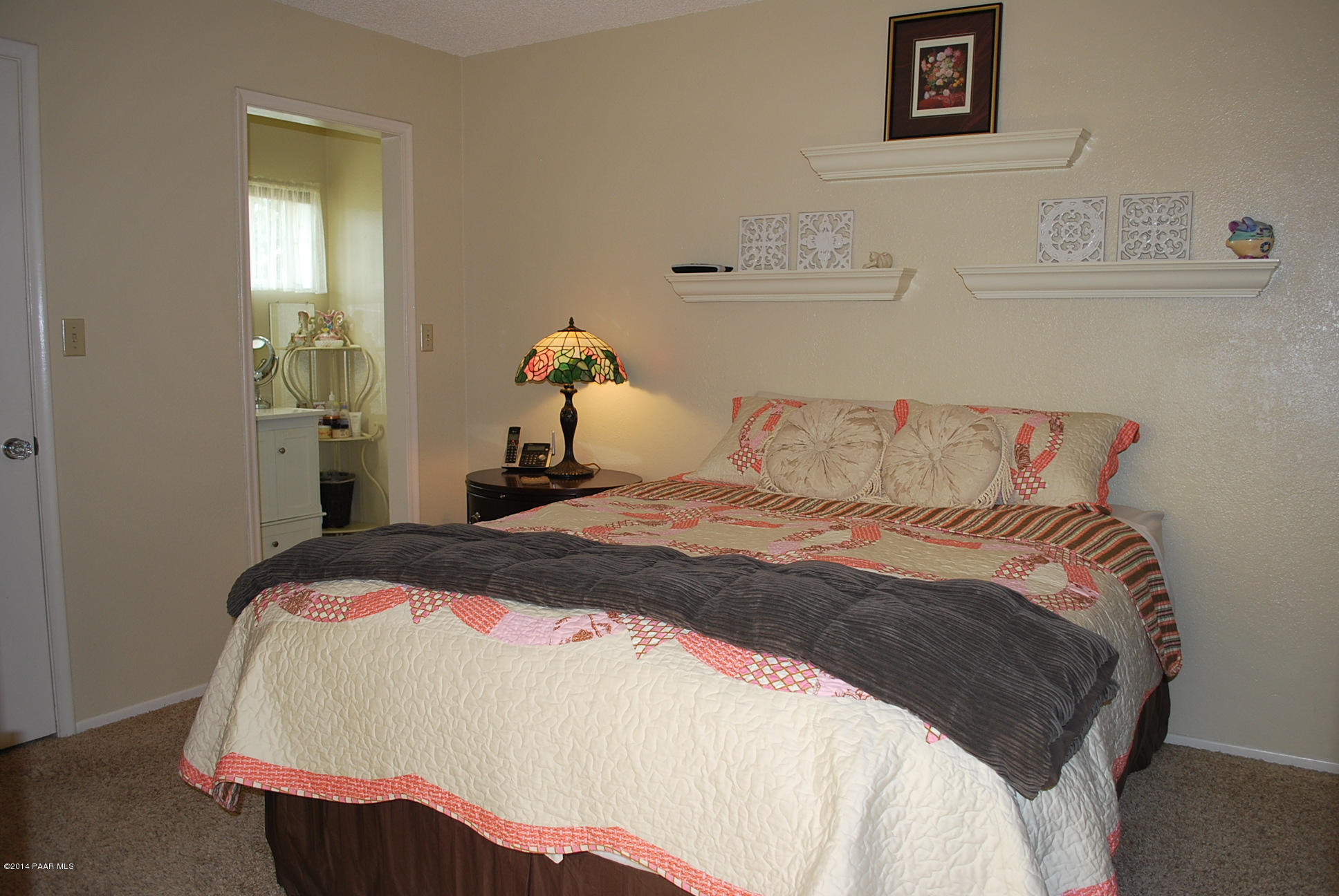 2701 Ridge Road Prescott, AZ 86301 - Photo 23 of 39 a bedroom with a bed and a mirror