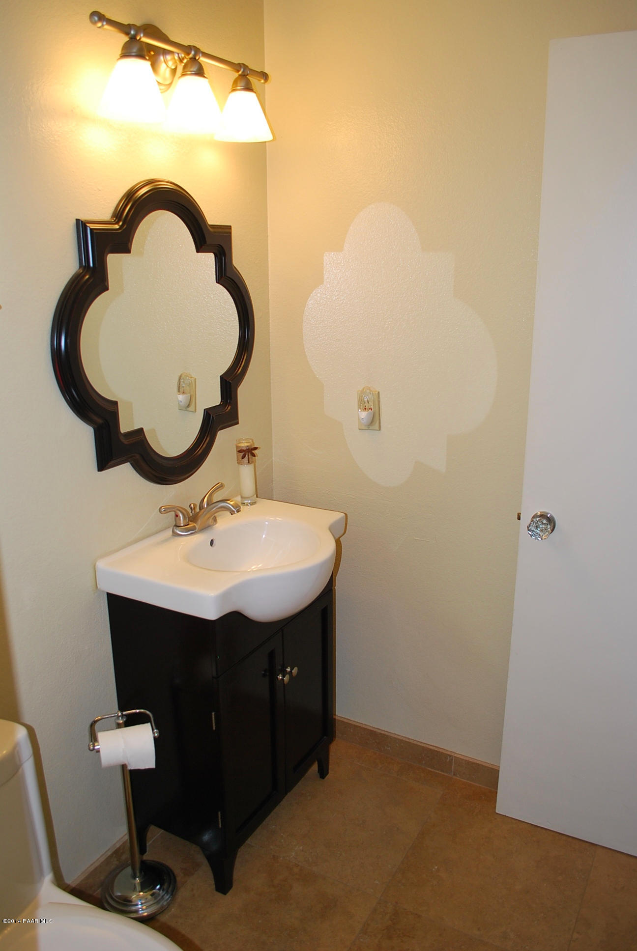 2701 Ridge Road Prescott, AZ 86301 - Photo 27 of 39 a bathroom with a sink and a mirror