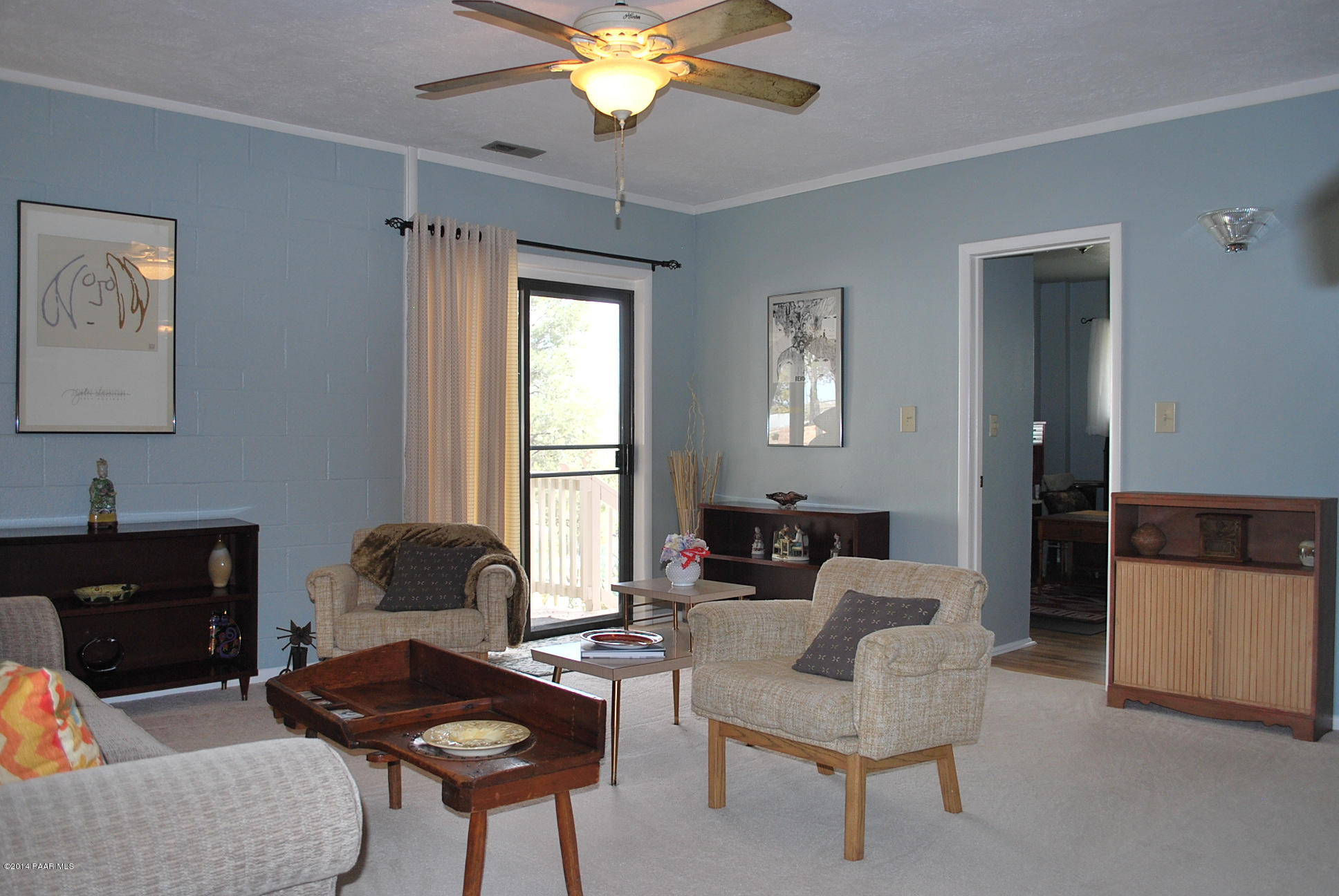 2701 Ridge Road Prescott, AZ 86301 - Photo 33 of 39 a living room with furniture and a fireplace