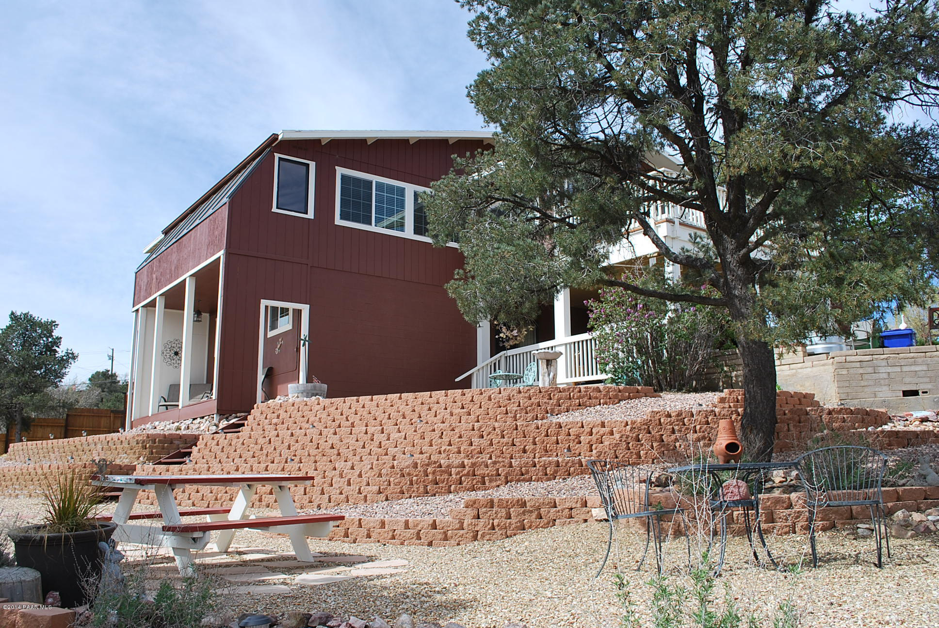 2701 Ridge Road Prescott, AZ 86301 - Photo 5 of 39 a front view of a house with a yard
