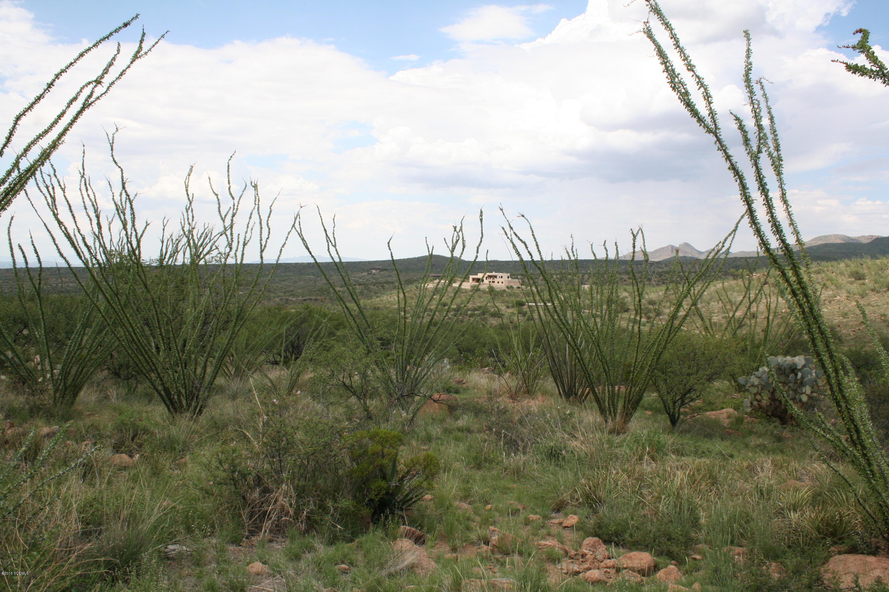 140 Tejano Springs Road Rio Rico, AZ 85648 - Photo 6 of 18 a view of a city and mountain view