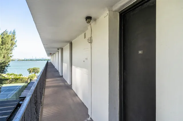 a hallway with wooden floor